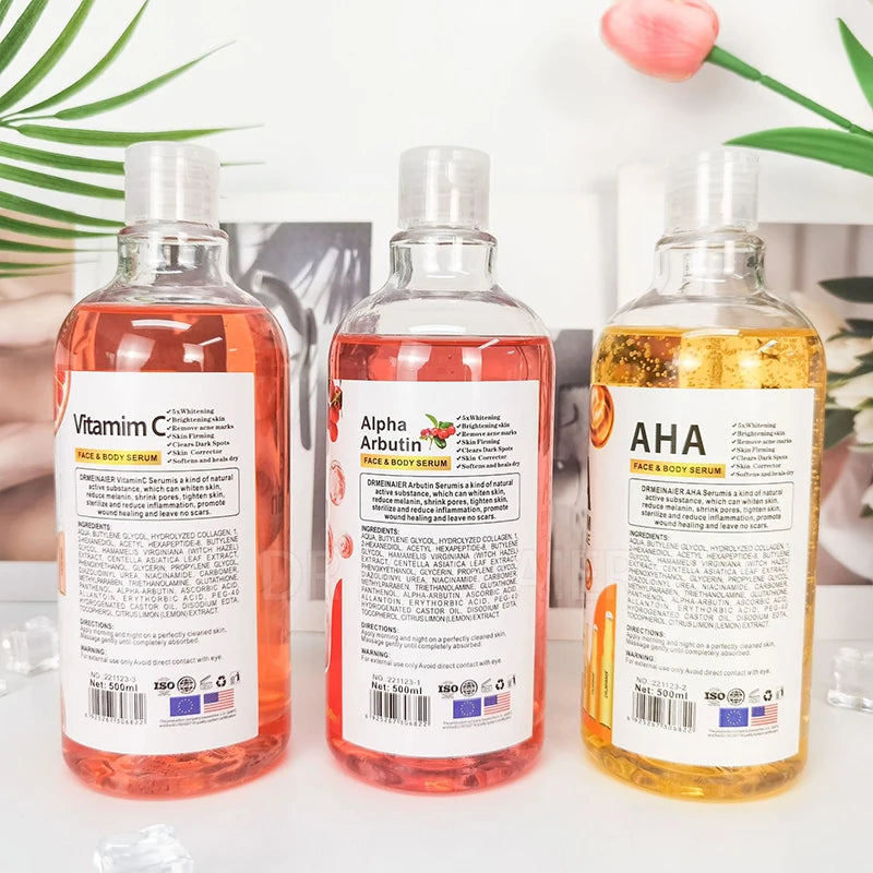 Three bottles of facial serum with visible labels on a white surface.