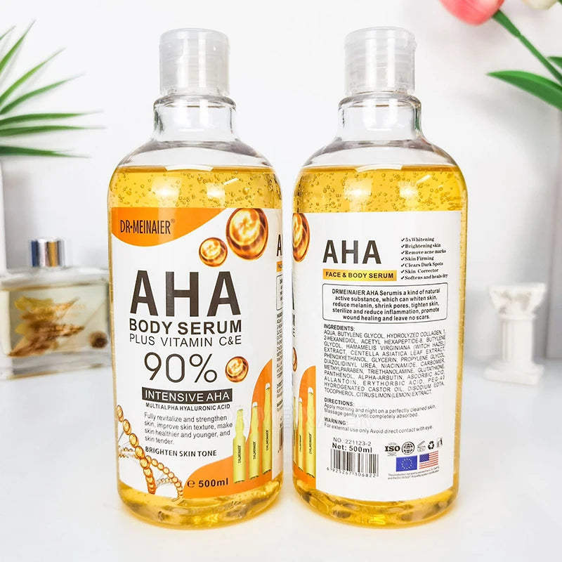 Two bottles of AHA body serum with labels on a light background