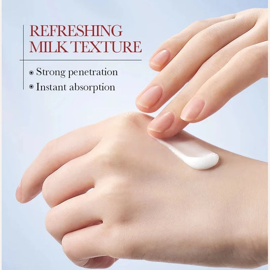 Hand applying cream to another hand with text about refreshing milk texture, strong penetration, and instant absorption.