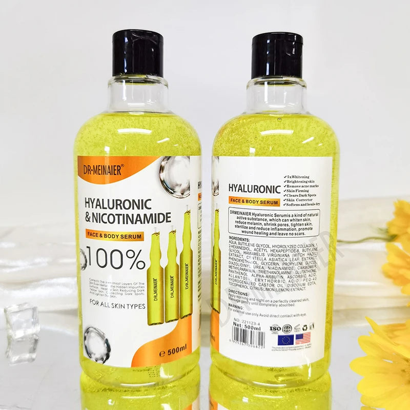 Two bottles of Dr. Meinaier Hyaluronic & Nicotinamide serum with a white background and yellow flowers.
